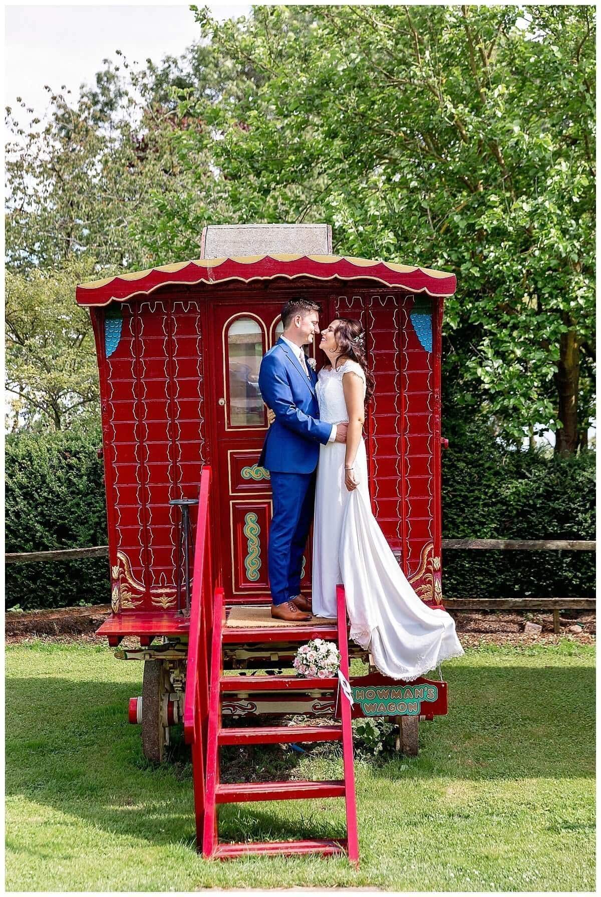 Bride & Groom on Gypsy Caravan at South Farm
