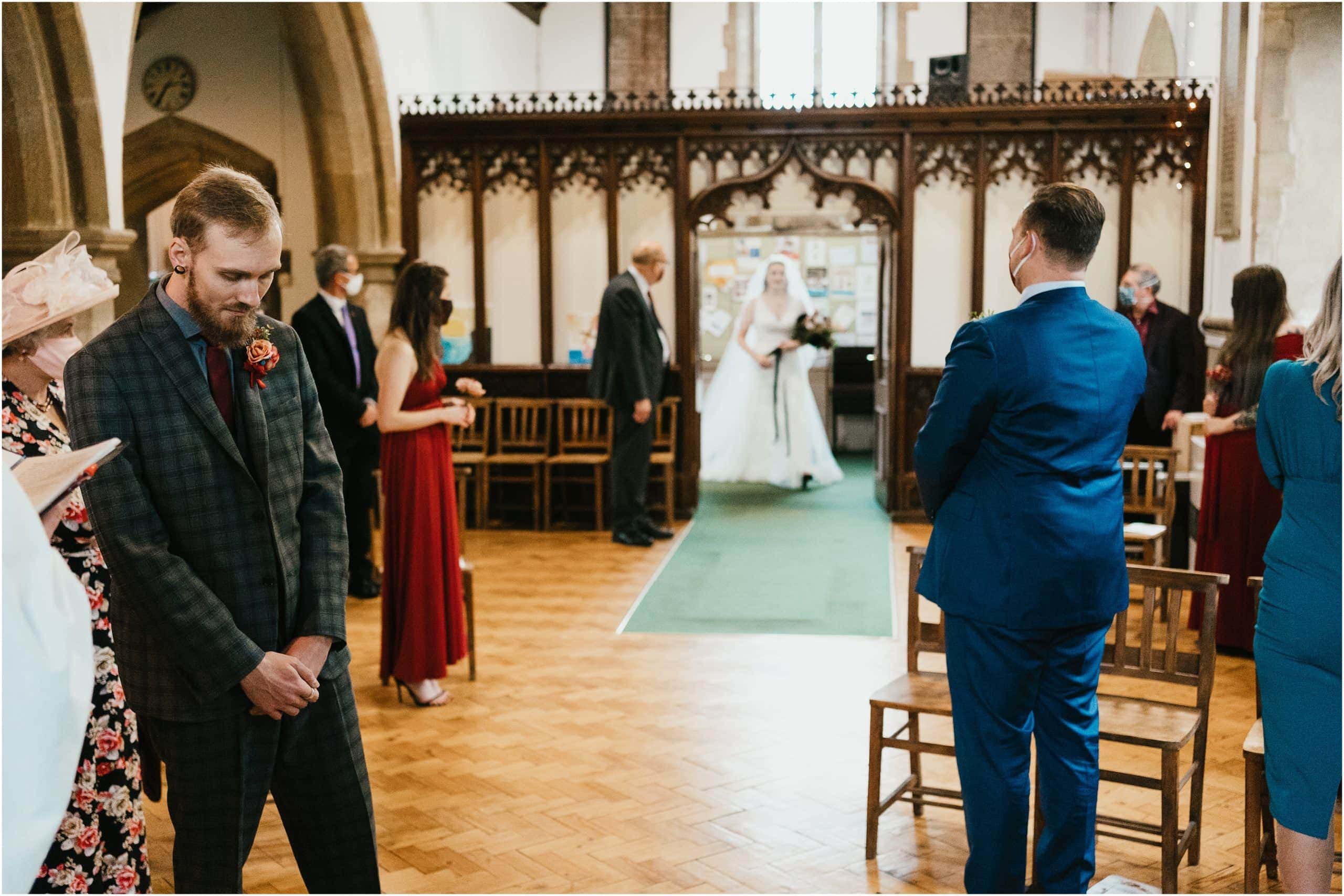 Bride walking into church